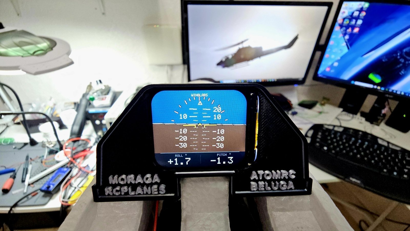 Personalized ATOMRC Beluga instrument panel with raised name and WingLabs attitude indicator