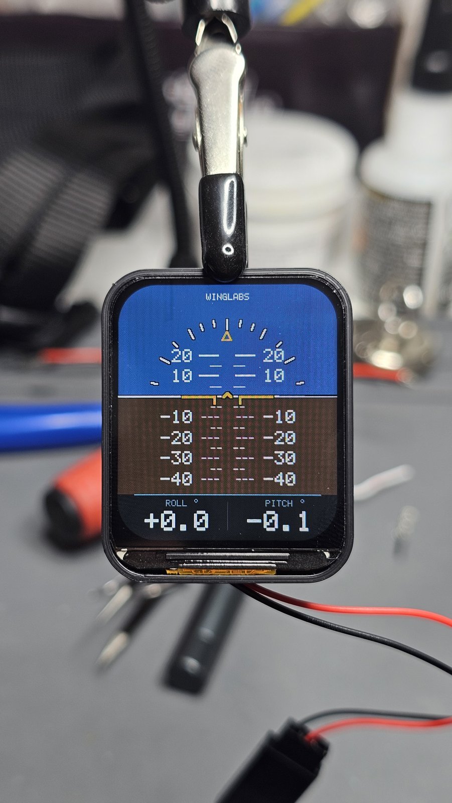 Attitude indicator reading level: roll 0.0, pitch -0.1