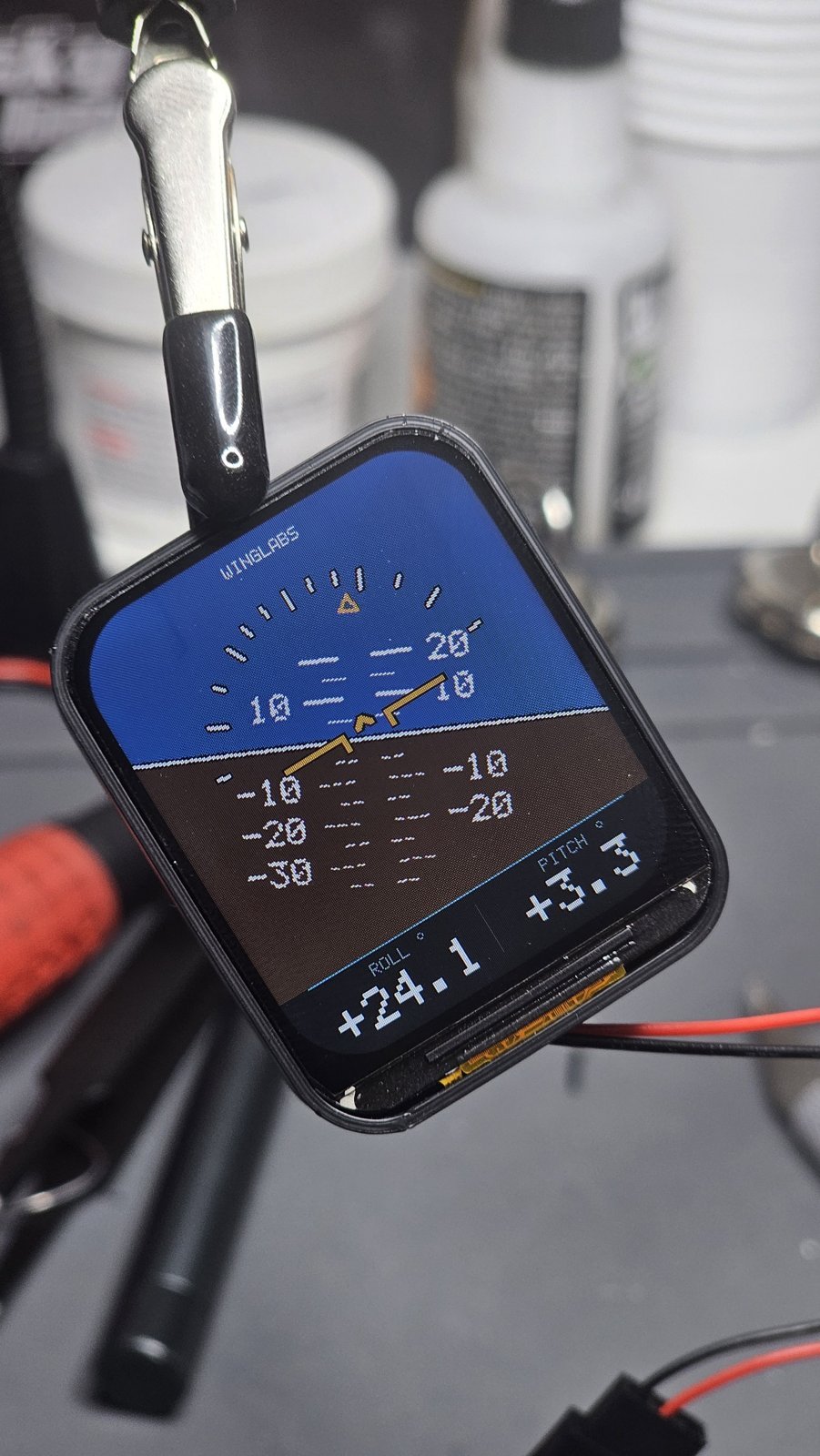 Universal vertical attitude indicator showing a right bank